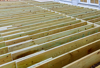 New deck installation in progress in the backyard of a Burbank home.